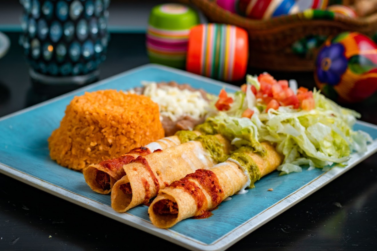 Rolled meat, salad, and rice